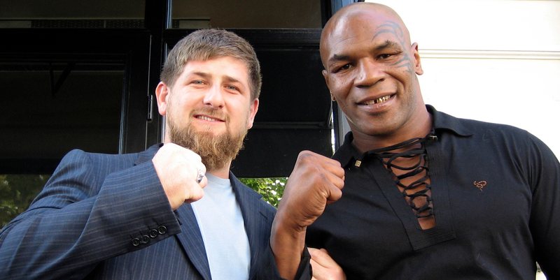 Illustration for article titled Why Are UFC Champions Hanging Out With An Accused Russian War Criminal?